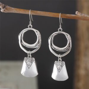 Ethic inspired earrings in silver alloy