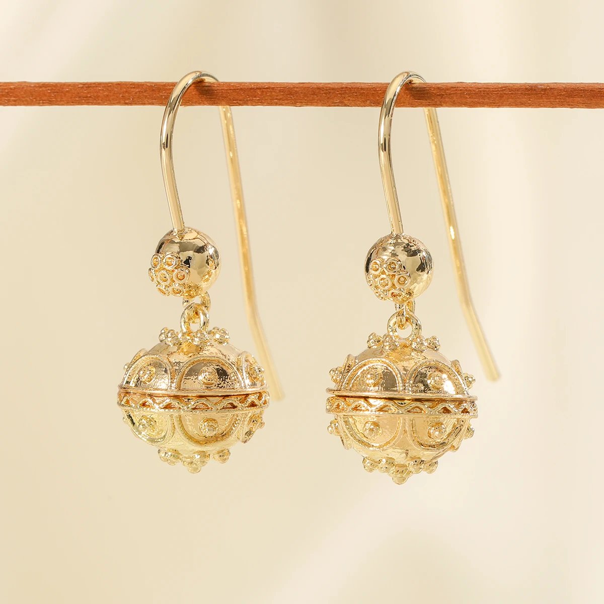 Elegant and minimalist style polished carved ball copper women's drop earrings suitable for party and date matching. - Image 6