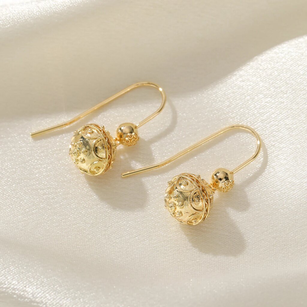 Elegant and minimalist style polished carved ball copper women's drop earrings suitable for party and date matching.
