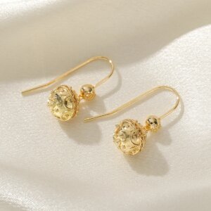 Elegant and minimalist style polished carved ball copper women's drop earrings suitable for party and date matching.
