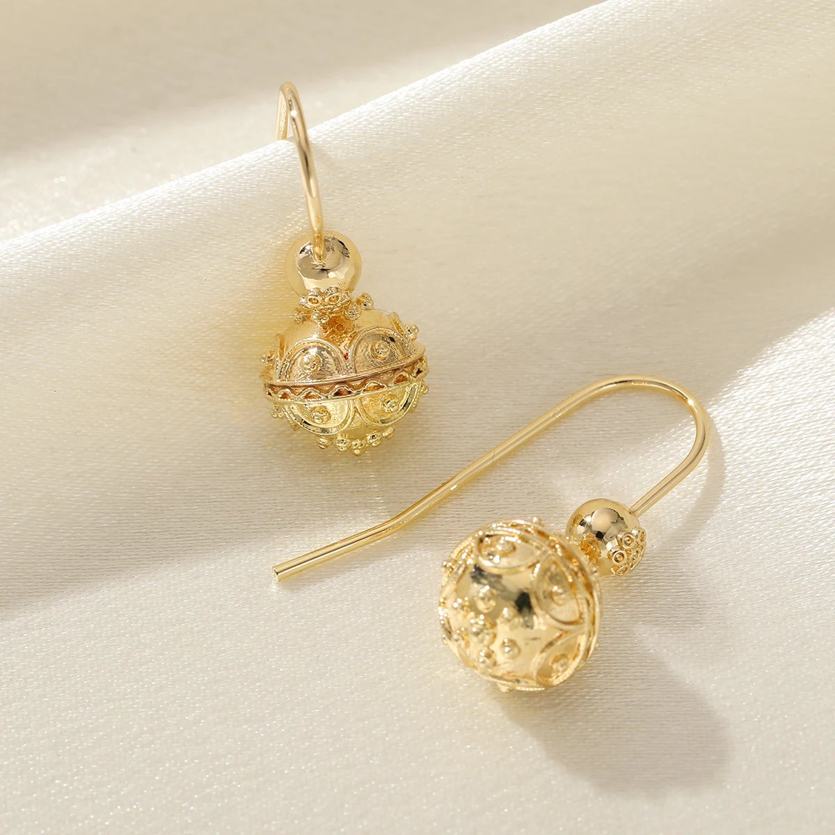 Elegant and minimalist style polished carved ball copper women's drop earrings suitable for party and date matching. - Image 3